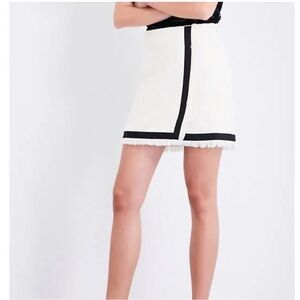 Elegant White Mini Skirt with Black Trim